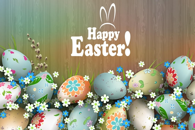 easter composition with a silhouette of a board, eggs with a beautiful diverse pattern, flowers and willow branch.