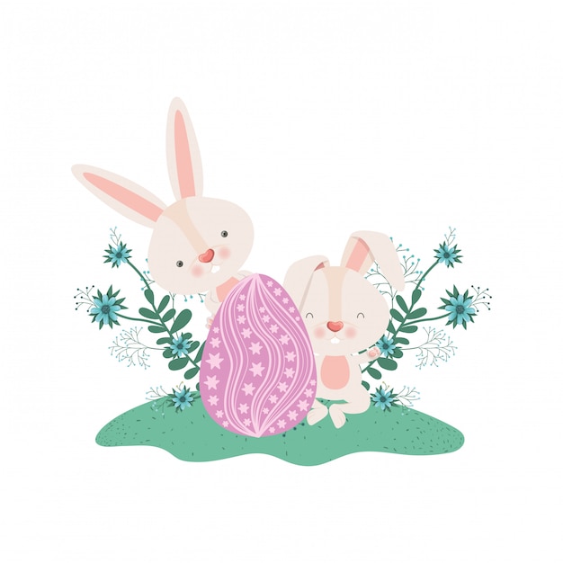 Easter rabbits with egg and flowers icon