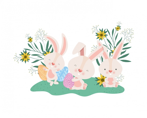 Easter rabbits with eggs and flowers icon