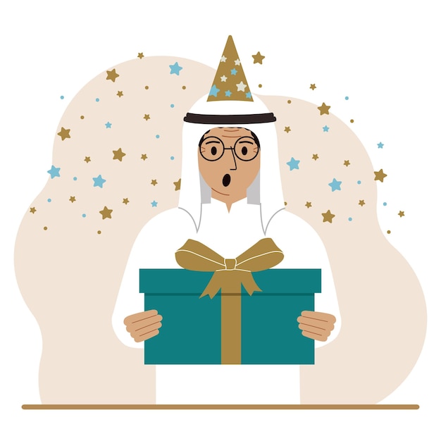 Een Arabische man met een feestelijke pet houdt een grote geschenkdoos met een strik vast