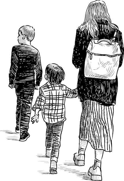 Een jonge moeder met haar kinderen aan het wandelen
