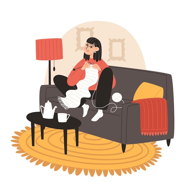 Een jonge vrouw breidt een sjaal in een gezellige kamer.