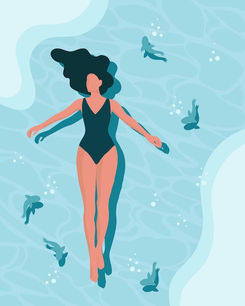 Een jonge vrouw in een turquoise zwempak ligt op het water in de zee met vissen Zomervakantie