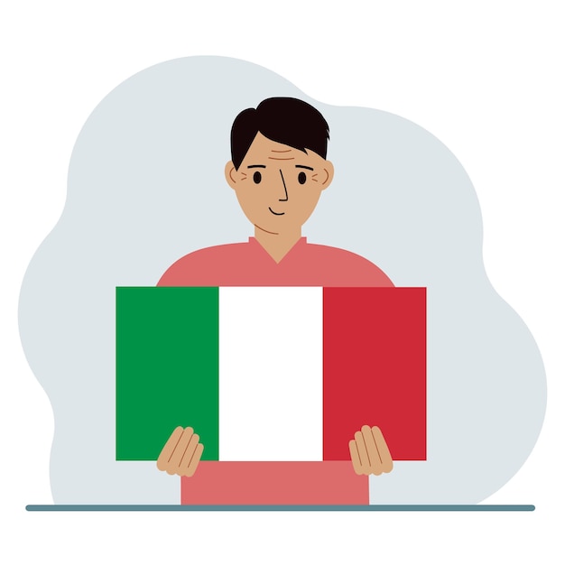 Een man houdt een Italiaanse vlag in zijn handen Het concept demonstratie nationale feestdag of patriottisme