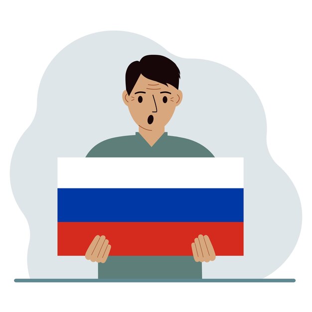 Een man houdt een Russische vlag in zijn handen Het concept demonstratie nationale feestdag of patriottisme Nationaliteit