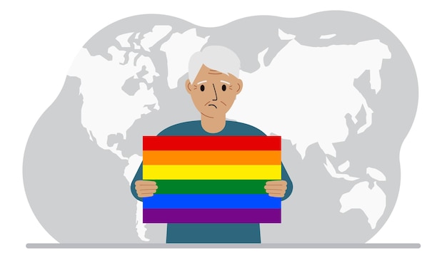 Een oude man houdt een lgbt-vlag in zijn handen tegen de achtergrond van een wereldkaart