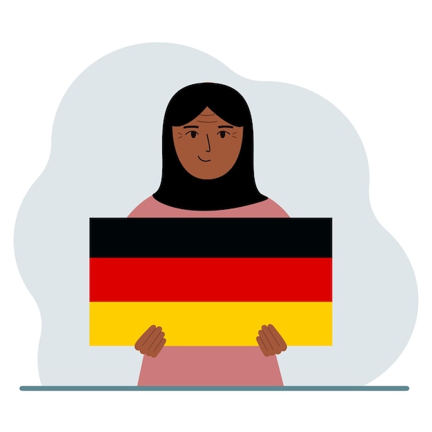 Een vrouw houdt een Duitse vlag in zijn handen Het concept demonstratie nationale feestdag of patriottisme Nationaliteit