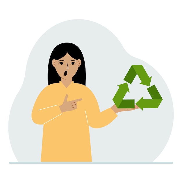 Een vrouw houdt een groen recycle recycling- of ecologiebord in zijn handen