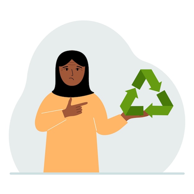 Een vrouw houdt een groen recycle recycling- of ecologiebord in zijn handen