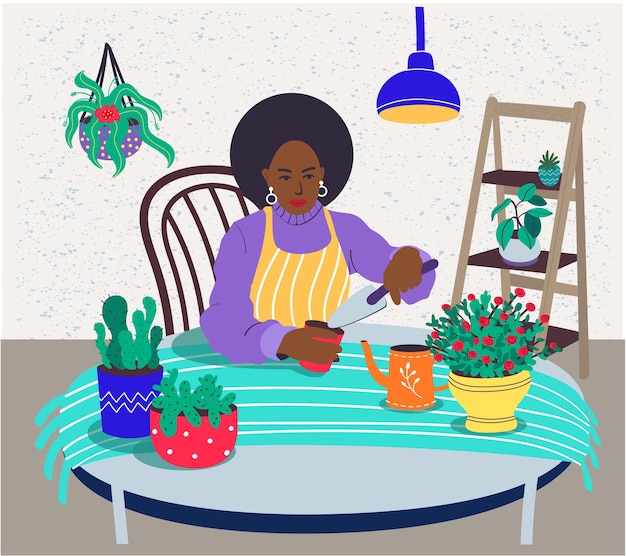 Een vrouw met een zwarte huid zorgt voor kamerplanten