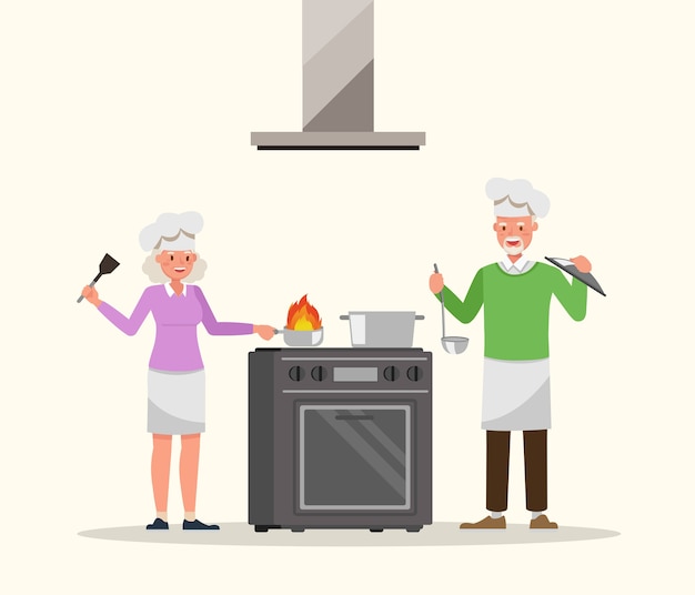 Coppie anziane che cucinano nel carattere della cucina