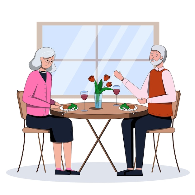 Elderly couple having dinner together at home senior man and woman enjoying meal and conversation