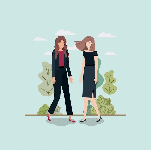 elegant businesswomen walking in the park