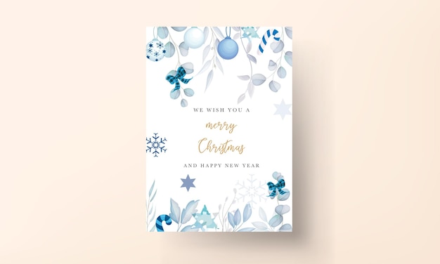 Vector elegant white christmas card design with leaves and christmas ornament