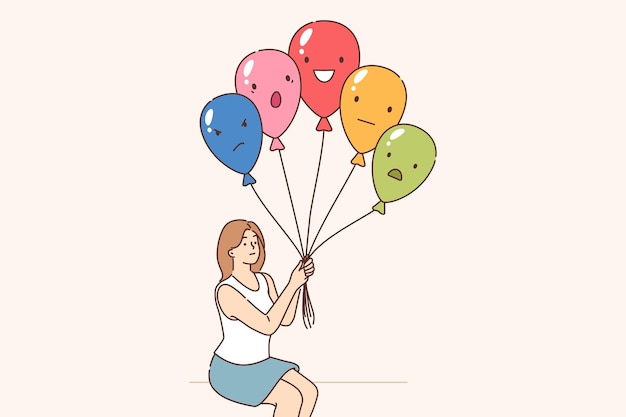 감정적 인 통제 는 긍정적 이나 부정적 인 표정 으로 풍선 을 들고 있는 여자 에 의해 행해진다