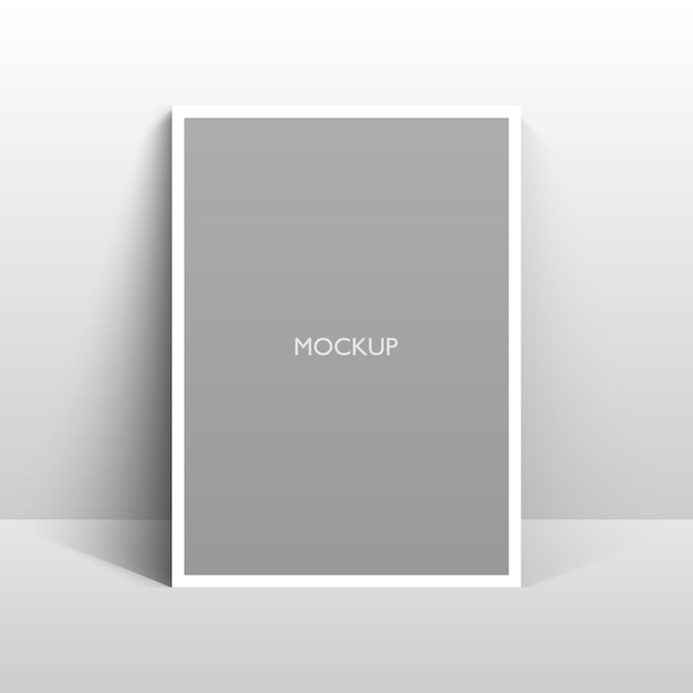 Empty white frame mockup on grey wall