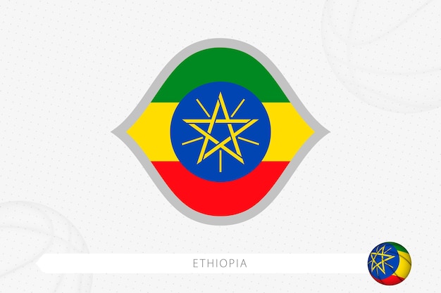 Ethiopia flag for basketball competition on gray basketball background.