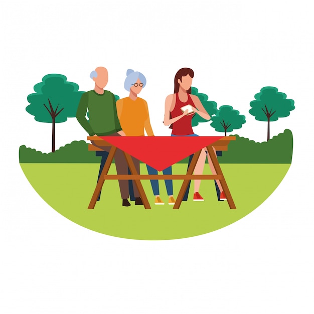 Faceless family eating outdoor table