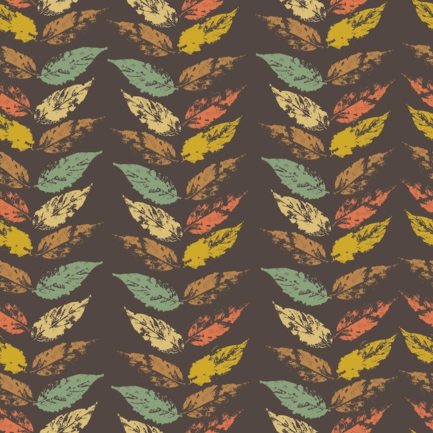 Vector fallen autumn leaves in vertical rows vector seamless pattern of stamps of natural leaves paint on paper background for fabric prints packaging and postcards