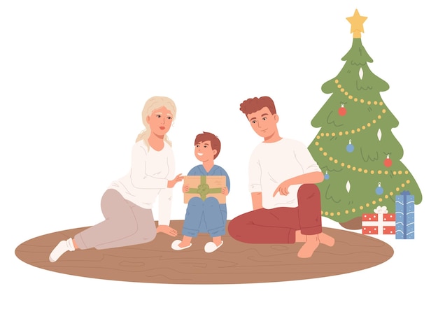 Famiglia che fa regali vicino all'albero di natale