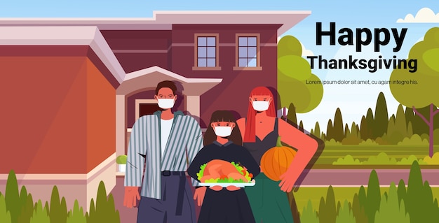 Family in masks celebrating happy thanksgiving day parents and child standing near house coronavirus quarantine concept portrait