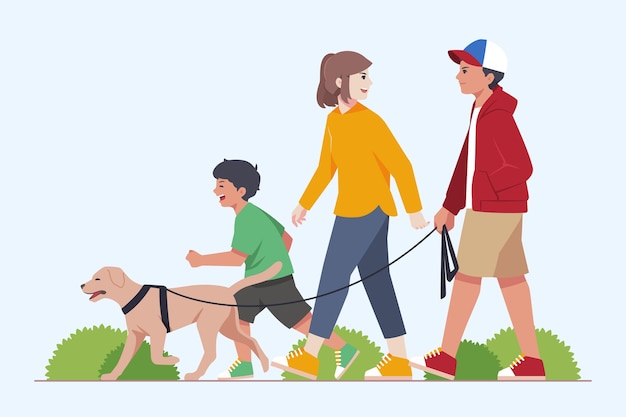犬と一緒に歩く家族