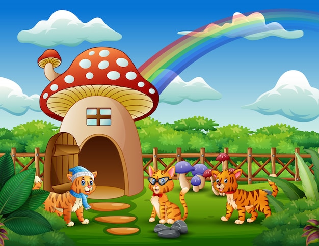 Fantasy house of mushroom with three cats