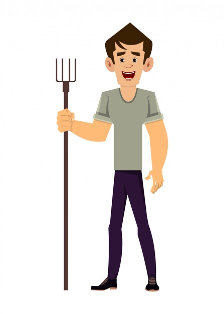 Farmer standing with holding agricultural fork