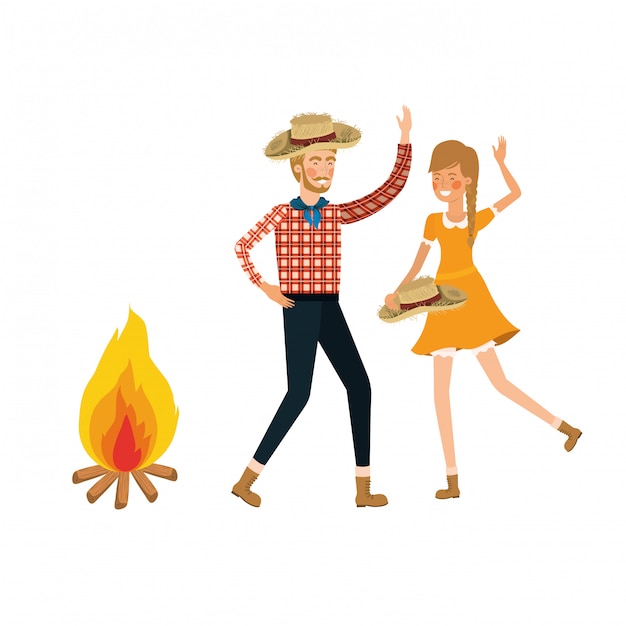 Farmers couple dancing with straw hat and bonfire