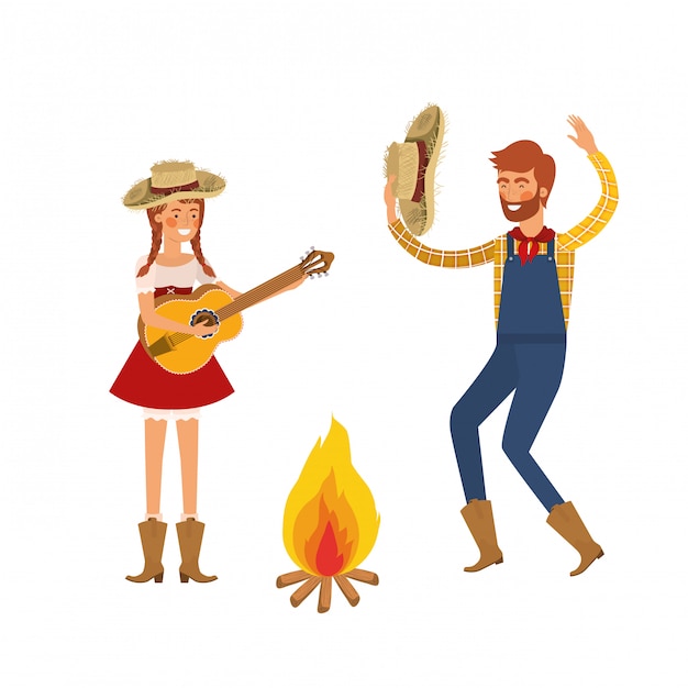 Farmers couple dancing with straw hat and bonfire