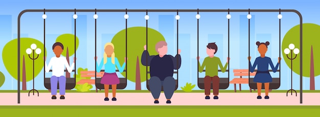 Fat obese guy swinging with mix race friends obesity concept people sitting on swing having fun outdoor landscape background  full length horizontal