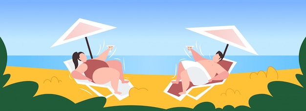 Fat obese man woman sunbathing overweight couple drinking cocktail lying on sun lounger under umbrella unhealthy lifestyle obesity concept seaside