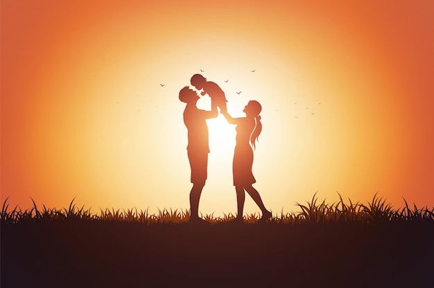 Father mother and children silhouette playing on grass in sunset.