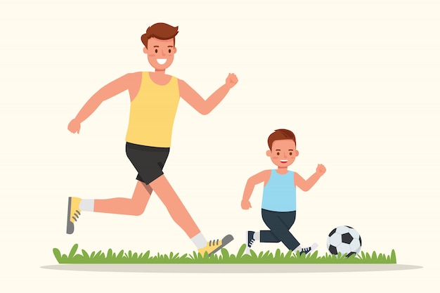 father and son playing football.