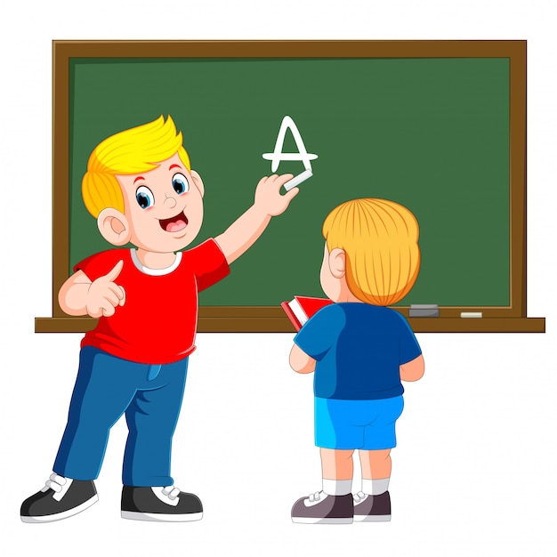 father teaches little son with chalkboard on background