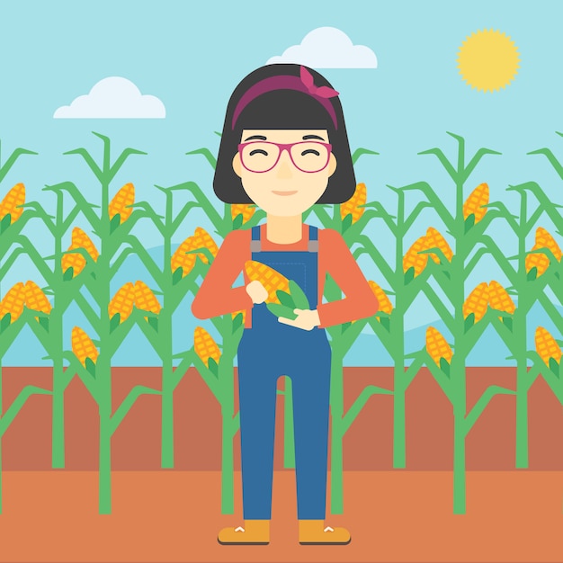 女性農家持株トウモロコシ