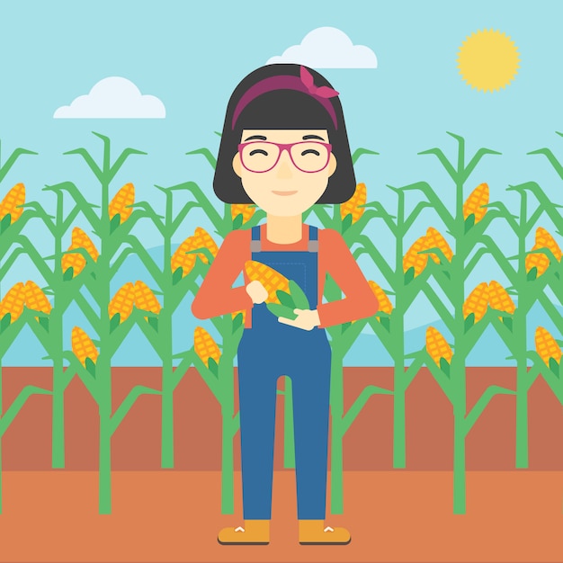 Vector female farmer holding corn