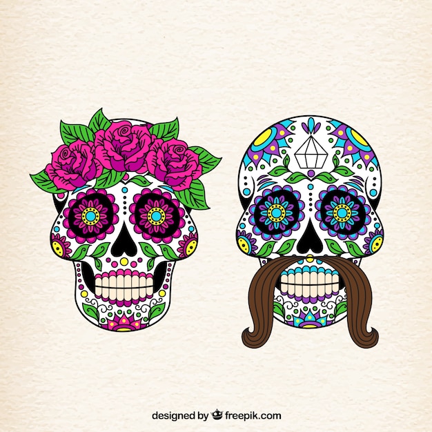 Vector female and male sugar skulls