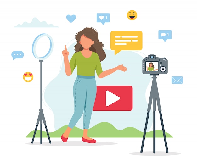 Female video blogger recording video with camera and light.