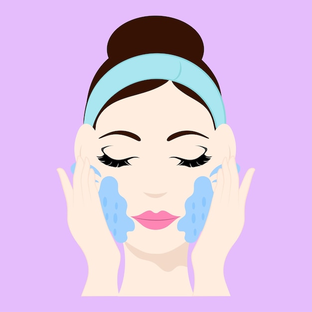 Female washing or cleaning her face against pink background