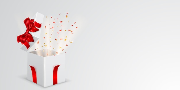 Праздничная иллюстрация с открытой белой подарочной коробкой с красными лентами и бантом. из нее вылетают кусочки серпантина и лучи света.