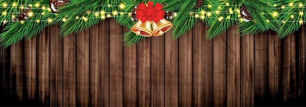 Fir Branch with Neon Lights on Wooden Background Pine Sprigs Above Christmas Decoration with Golden Bells and Red Bow