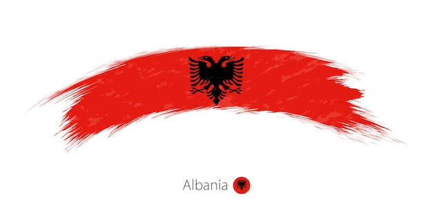 Flag of Albania in rounded grunge brush stroke. Vector illustration.