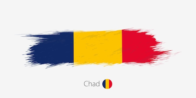 Flag of Chad grunge abstract brush stroke on gray background