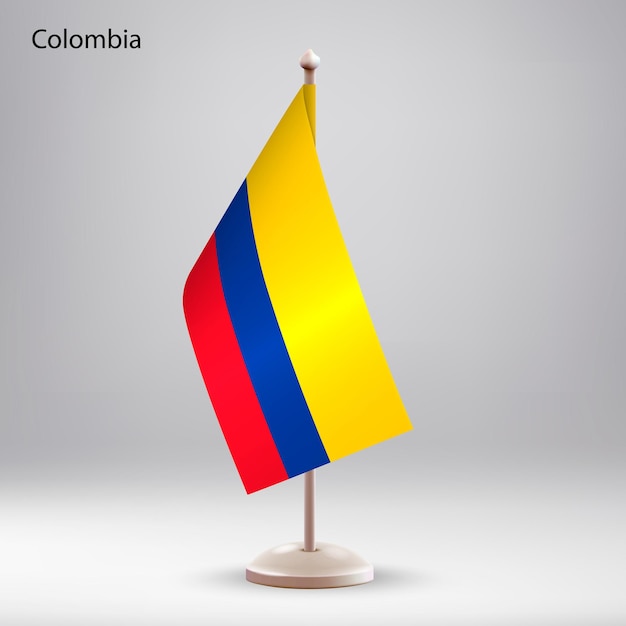 Bandiera della colombia appesa su un supporto per bandiere