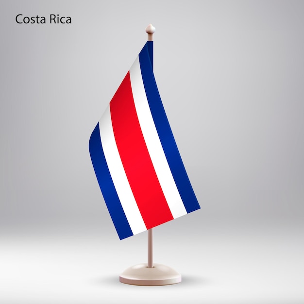 Vector flag of costa rica hanging on a flag stand