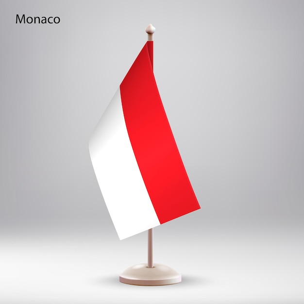 Vector flag of monaco hanging on a flag stand