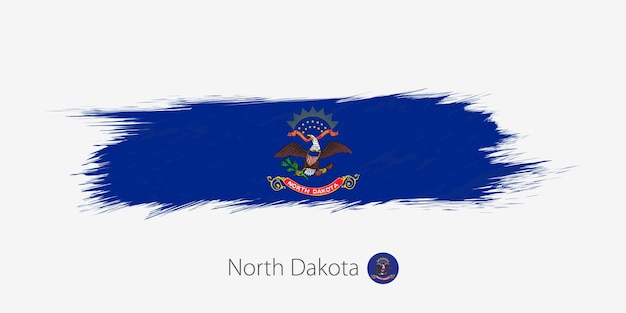 灰色の背景にノースダコタ州のグランジ抽象的なブラシストロークの旗