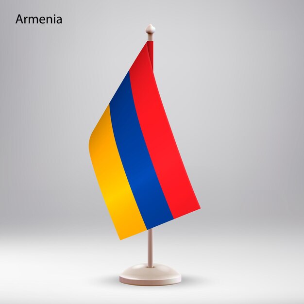 Вектор Флаг армении висит на подставке для флага