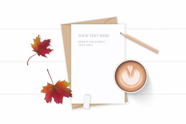 Vector flat lay top view elegant white composition letter kraft paper envelope autumn maple leaf pencil eraser and coffee on wooden background.